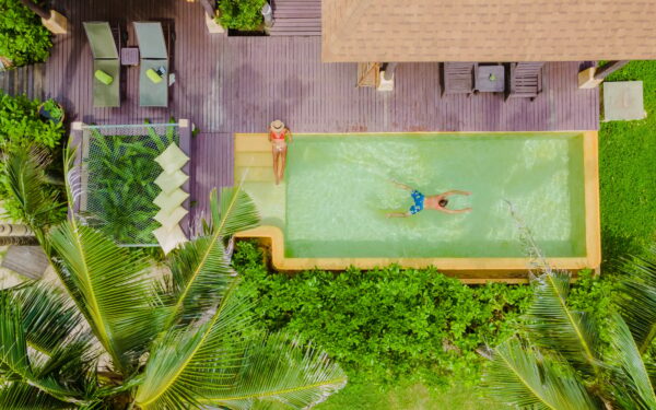 Modern house with a swimming pool, modern pool villa at the beach, luxury villa